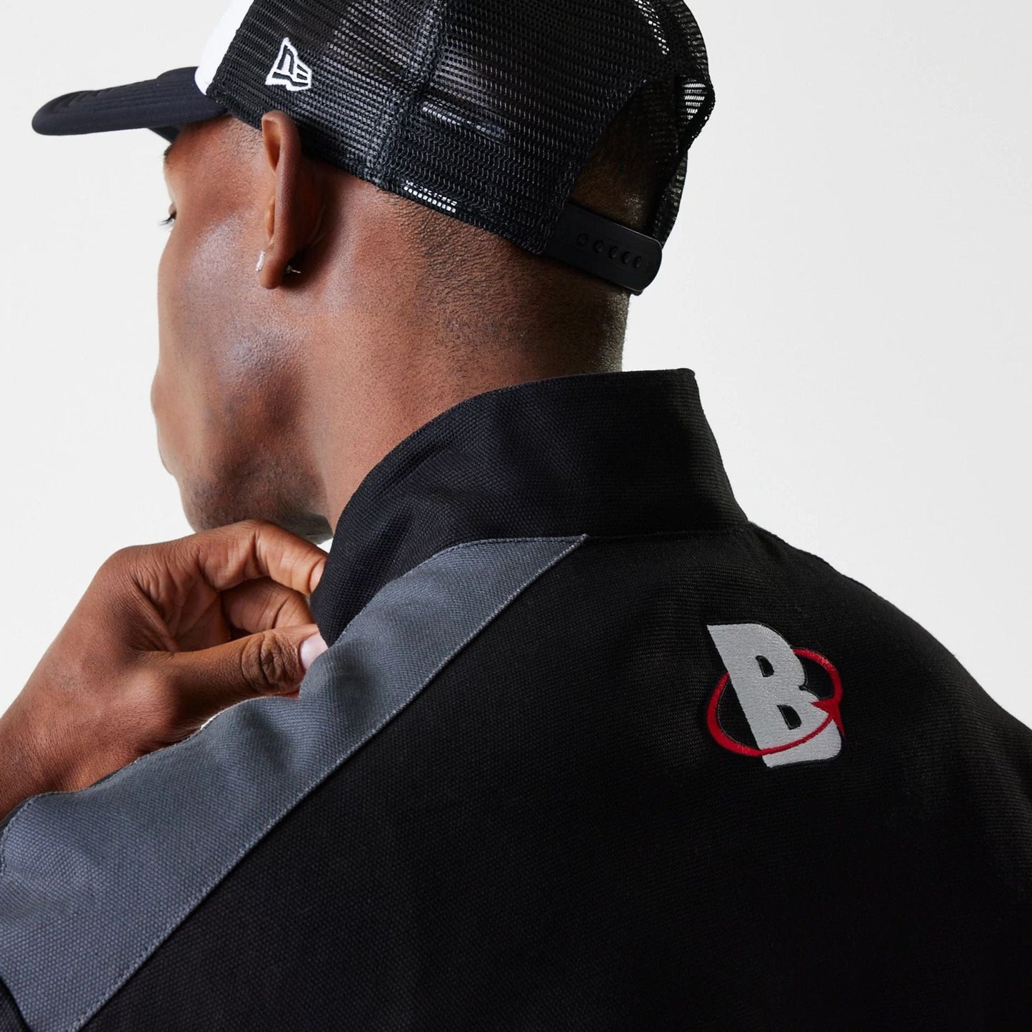 The Male model is wearing Chicago Bulls NBA Motorsport Black Motorsports Jacket 6