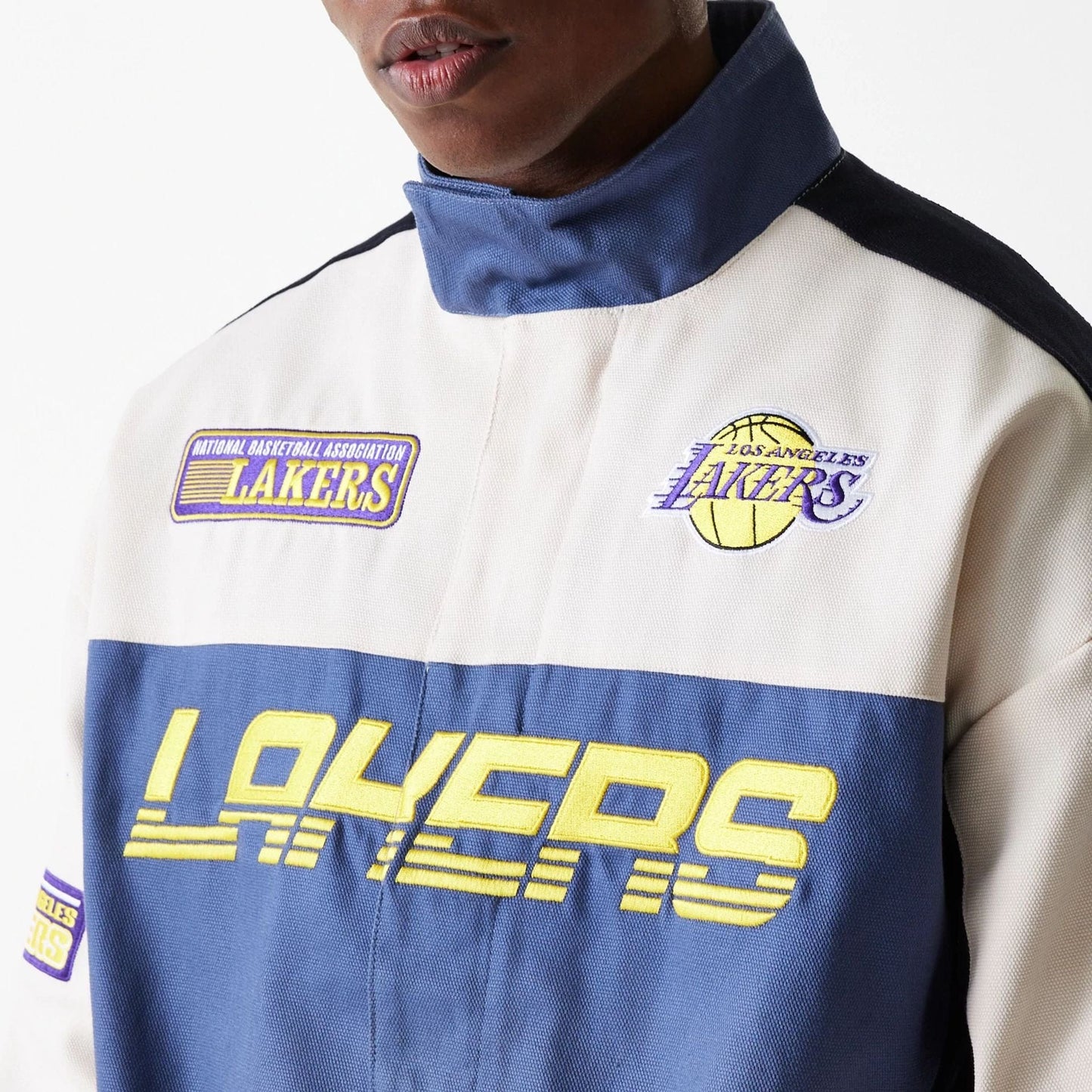 The Male model is wearing LA Lakers NBA Motorsport Dark Blue Motorsports Jacket 5