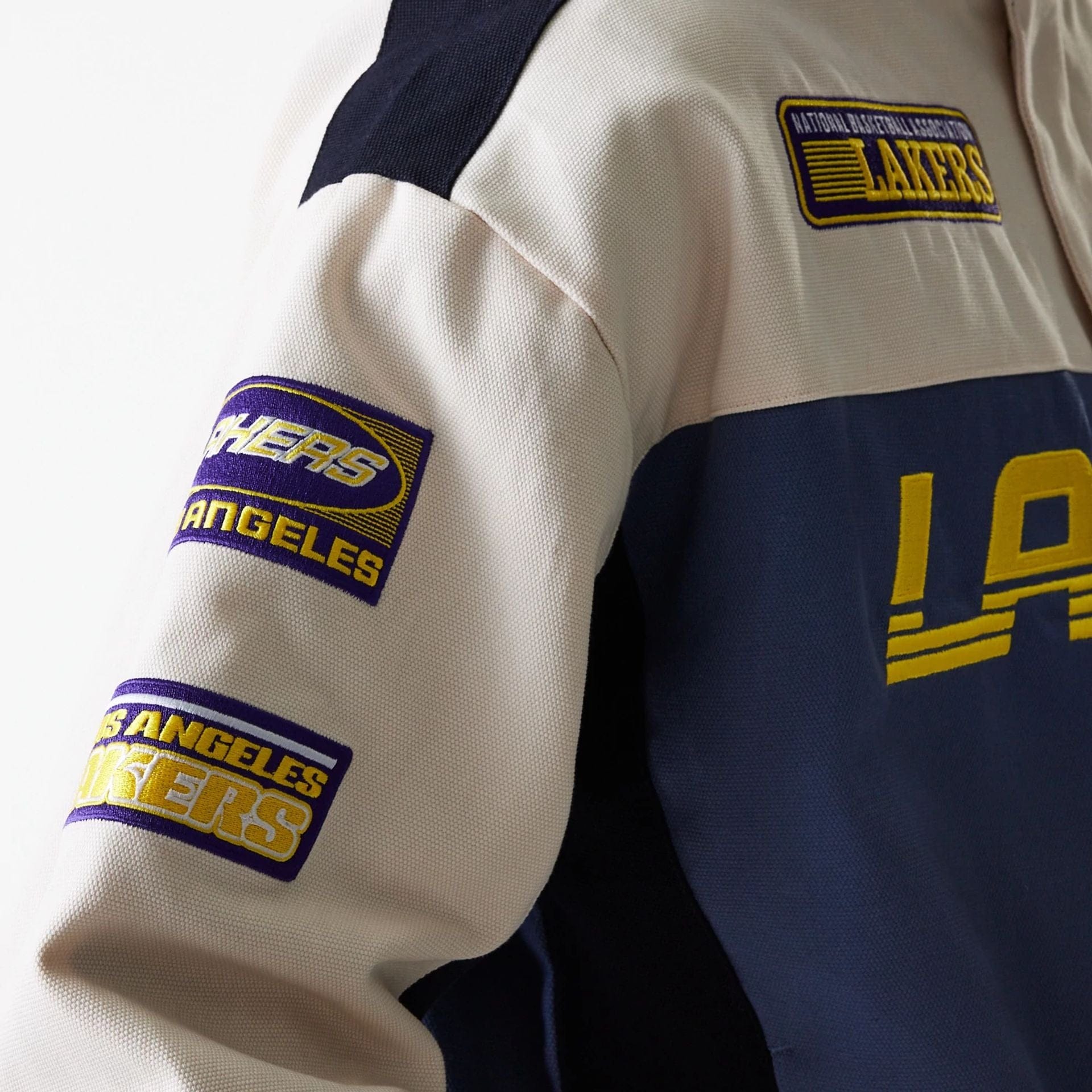 The Male model is wearing LA Lakers NBA Motorsport Dark Blue Motorsports Jacket 6