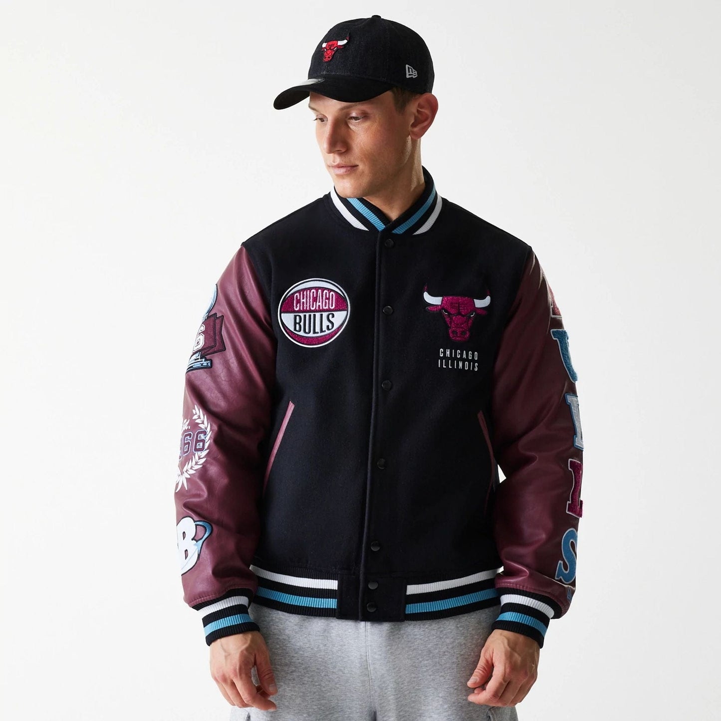 The Male model is wearing Chicago Bulls NBA Patch Black Varsity Jacket 1