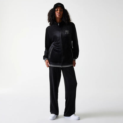The Male model is wearing New York Yankees MLB Velour Black Track Pants 4