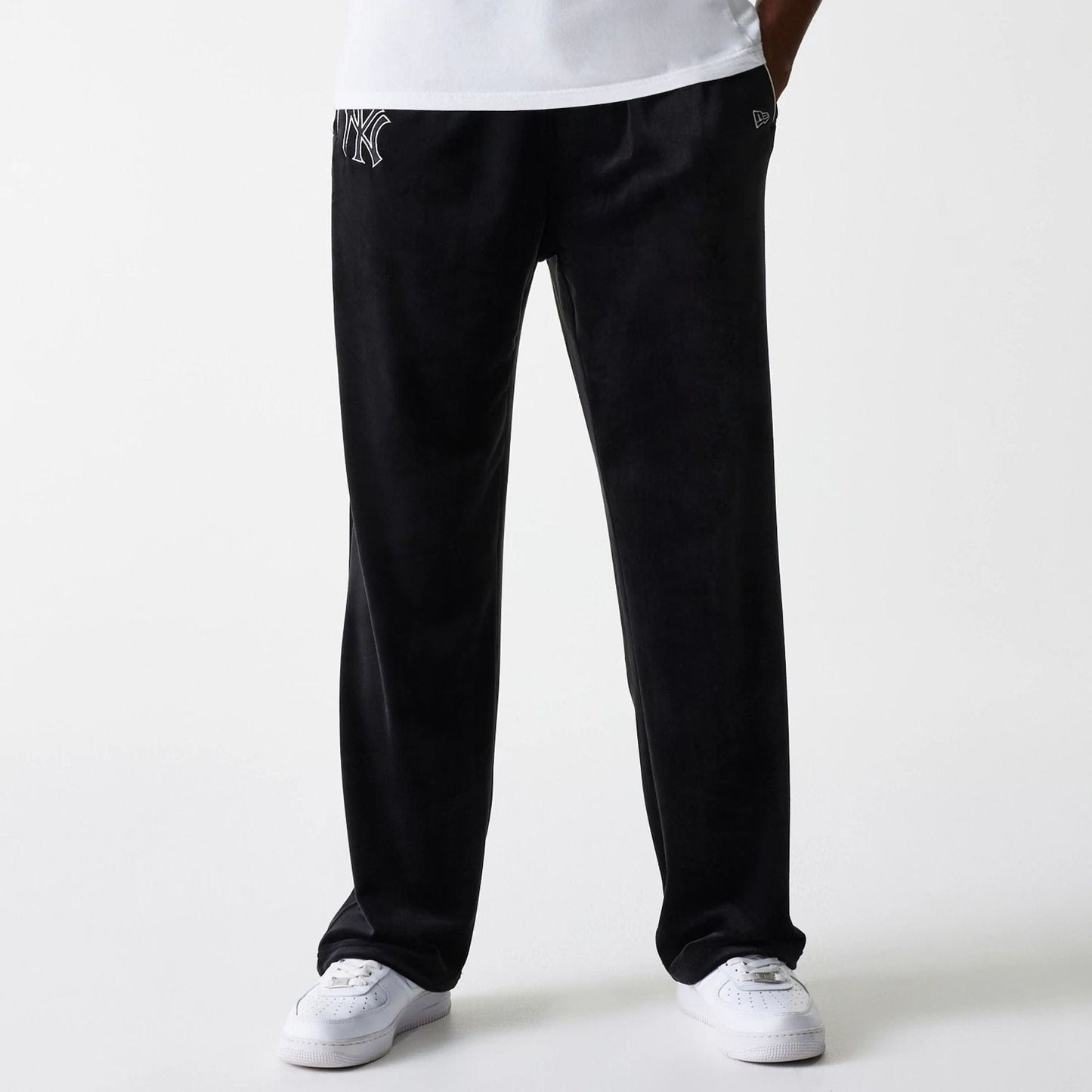 The Male model is wearing New York Yankees MLB Velour Black Track Pants 5