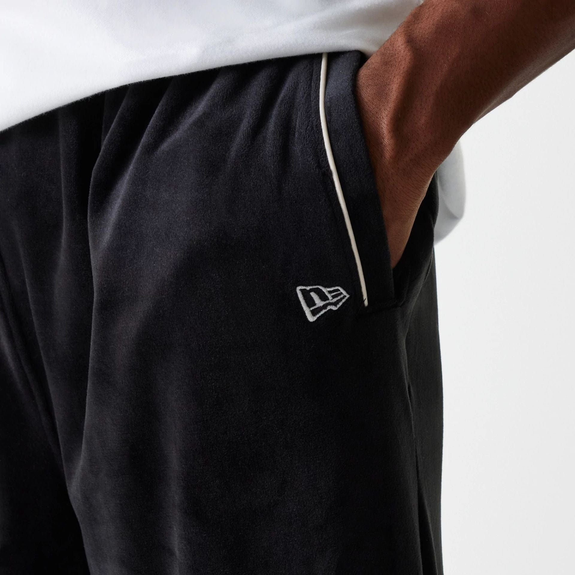 The Male model is wearing New York Yankees MLB Velour Black Track Pants 7