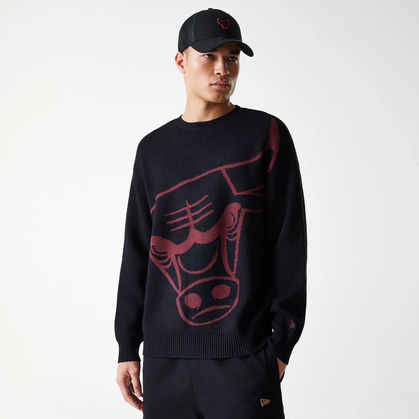 The Male model is wearing Chicago Bulls NBA Knit Black Oversized Knit Sweater 3