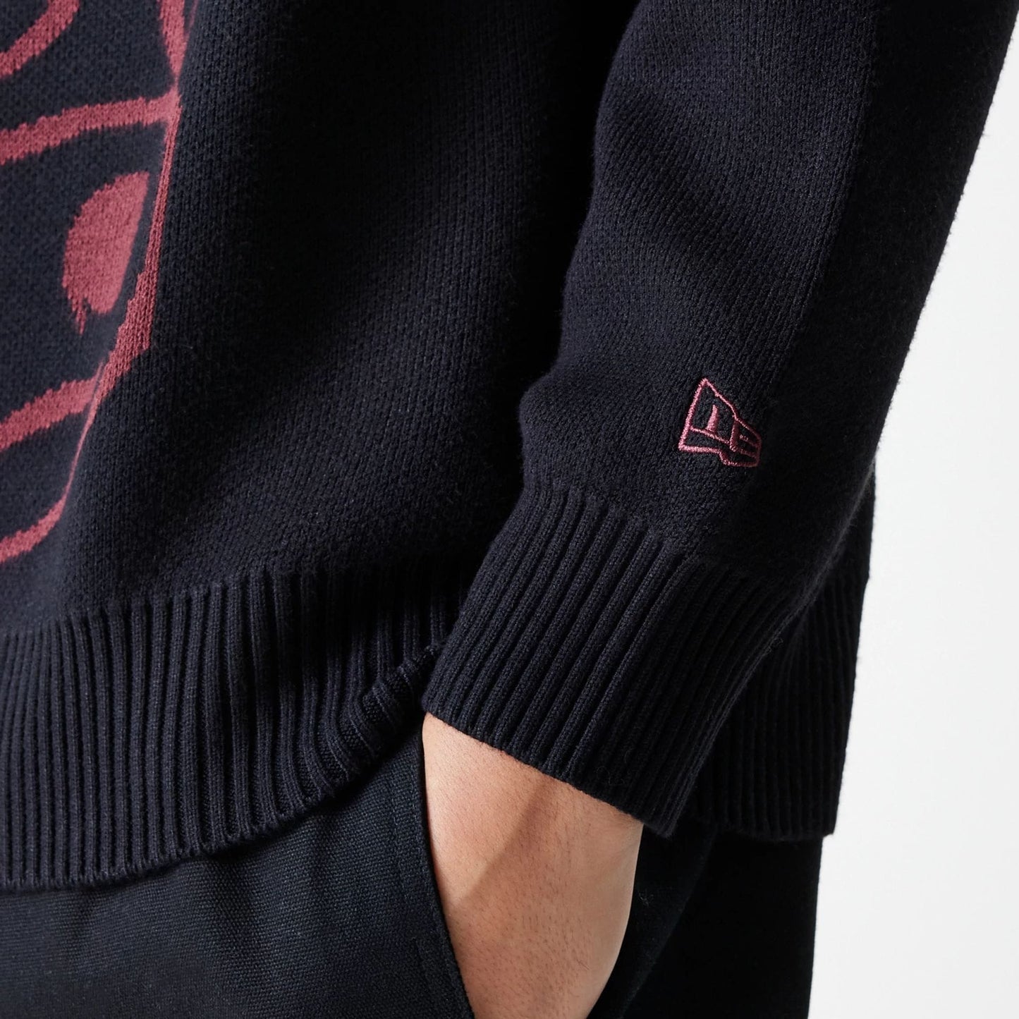 The Male model is wearing Chicago Bulls NBA Knit Black Oversized Knit Sweater 7