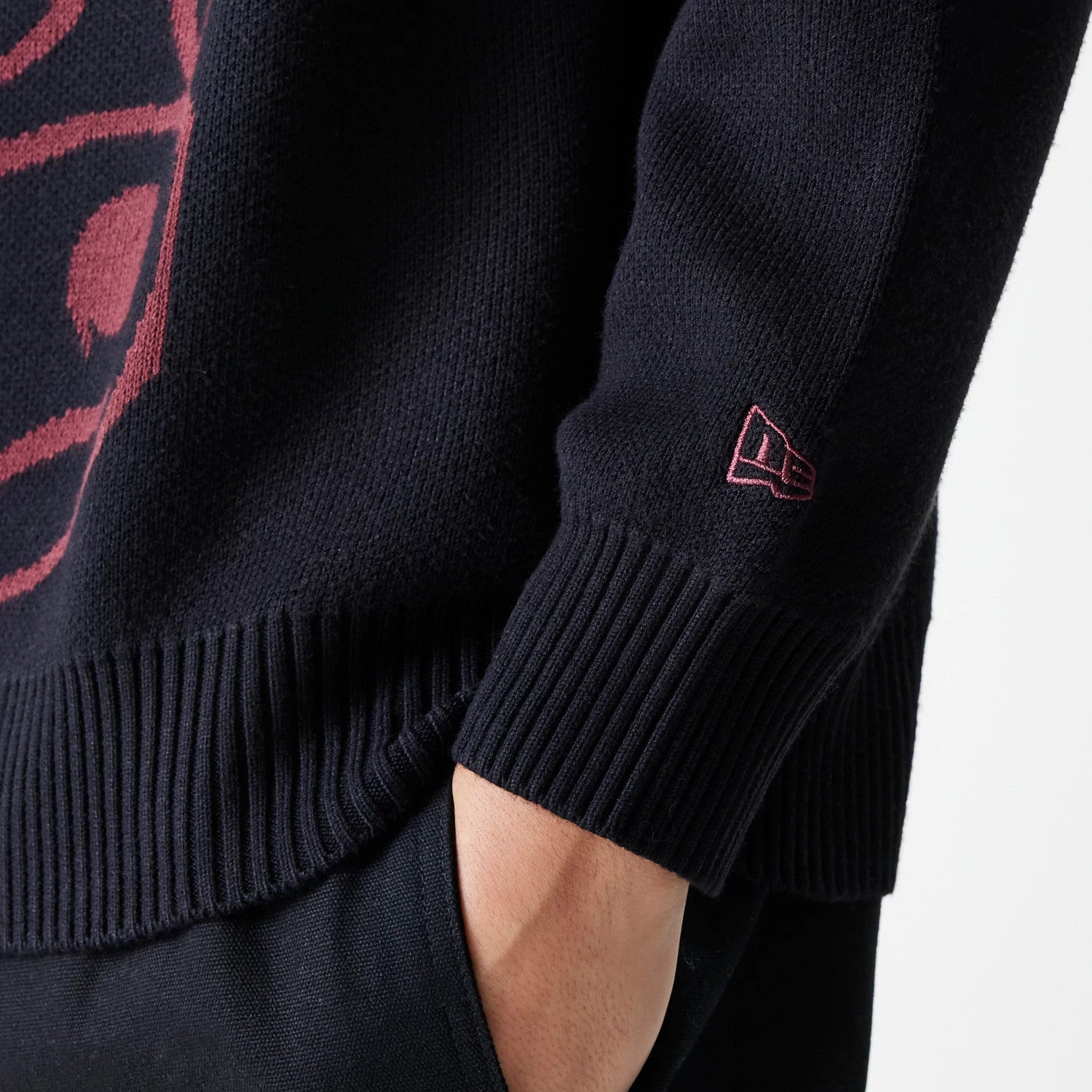The Male model is wearing Chicago Bulls NBA Knit Black Oversized Knit Sweater 7