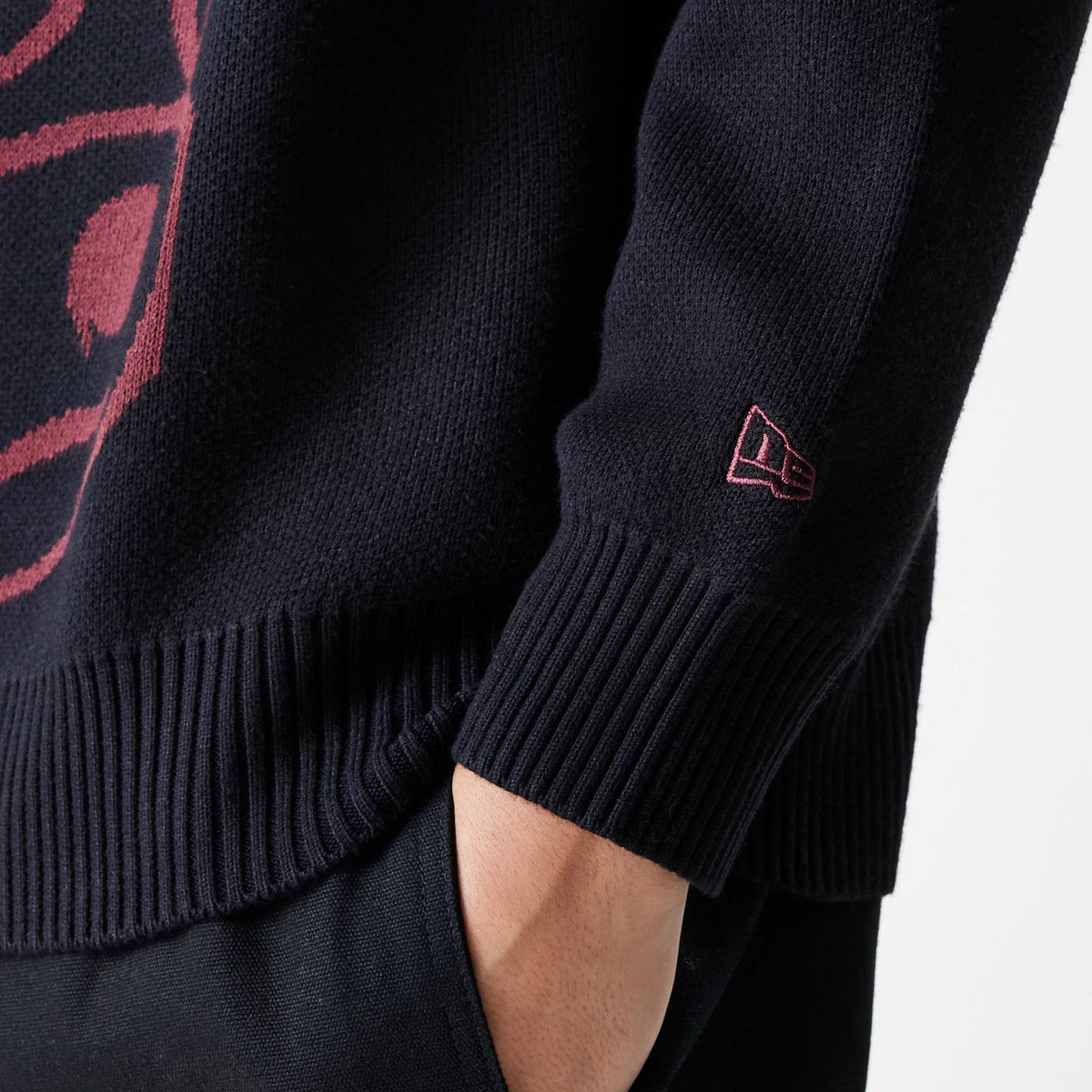 The Male model is wearing Chicago Bulls NBA Knit Black Oversized Knit Sweater 7