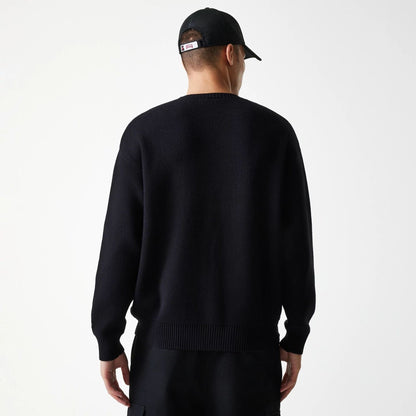 The Male model is wearing Chicago Bulls NBA Knit Black Oversized Knit Sweater 2