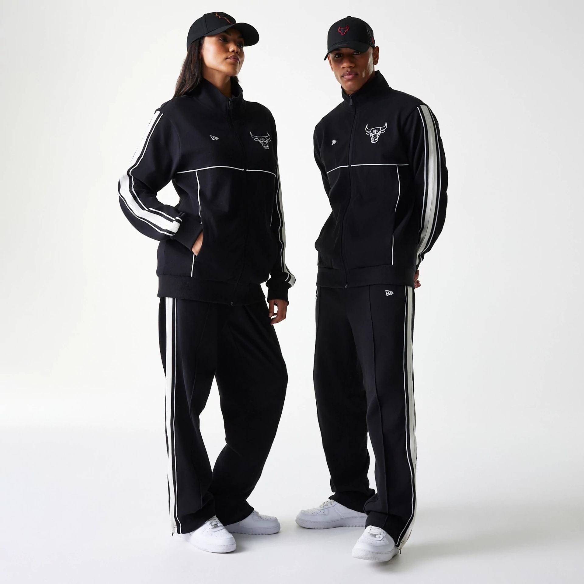 The Male model is wearing Chicago Bulls NBA Outline Black Track Jacket 1