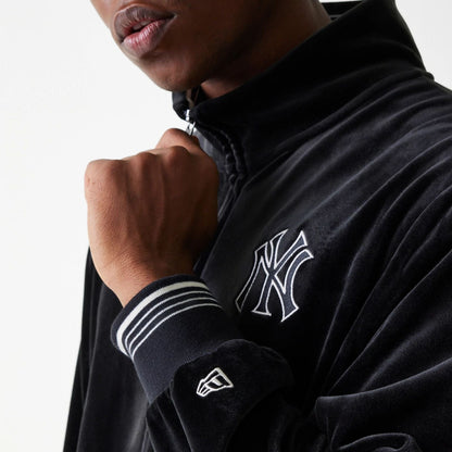 The Male model is wearing New York Yankees MLB Velour Black Track Top 7