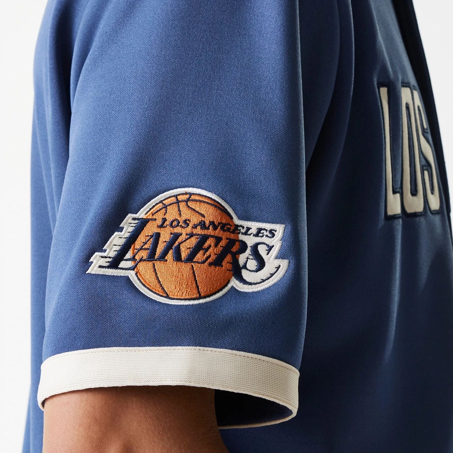 The Male model is wearing LA Lakers NBA Snap Button Dark Blue Short Sleeve Shirt 6