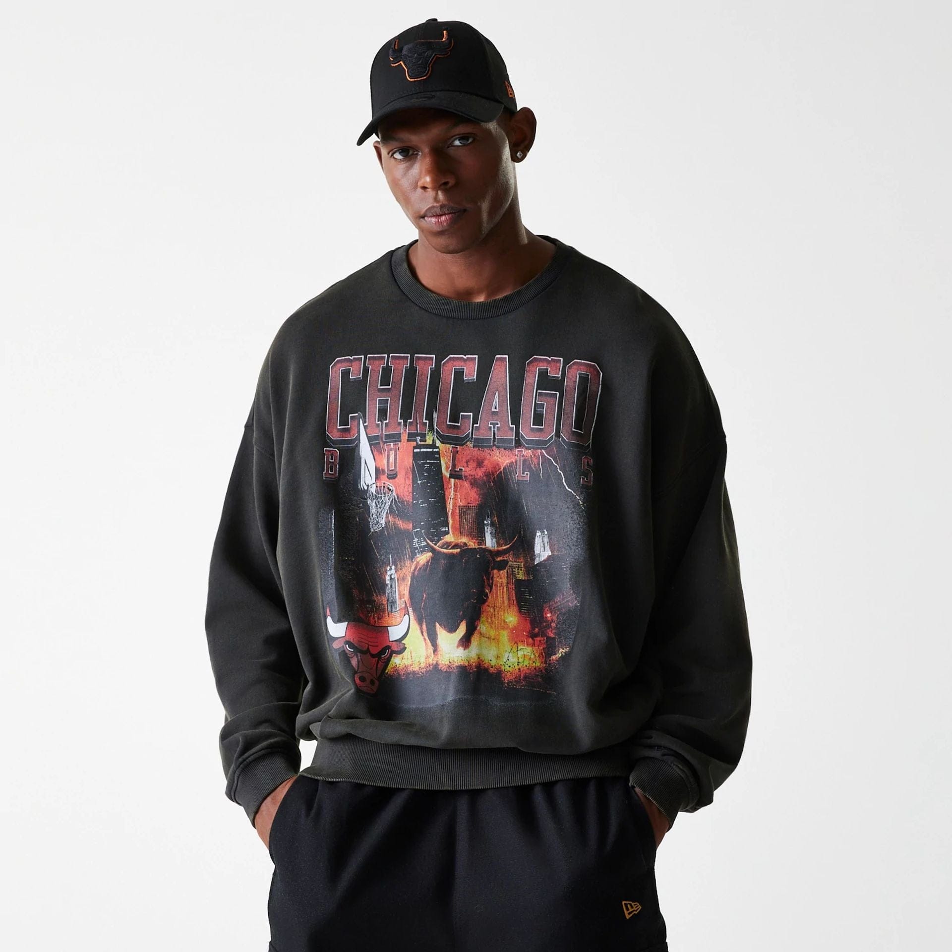 The Male model is wearing Chicago Bulls NBA Washed Graphic Grey Oversized Crew Neck Sweater 3