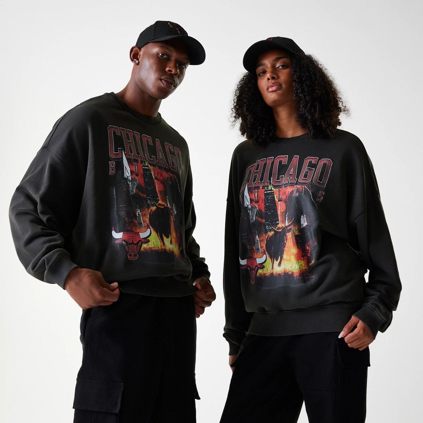 The Male model is wearing Chicago Bulls NBA Washed Graphic Grey Oversized Crew Neck Sweater 1