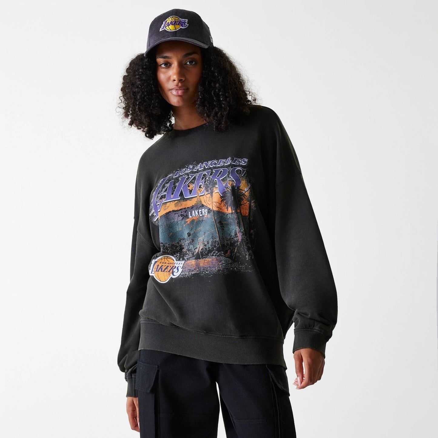 The Male model is wearing LA Lakers NBA Washed Graphic Grey Oversized Crew Neck Sweater 4