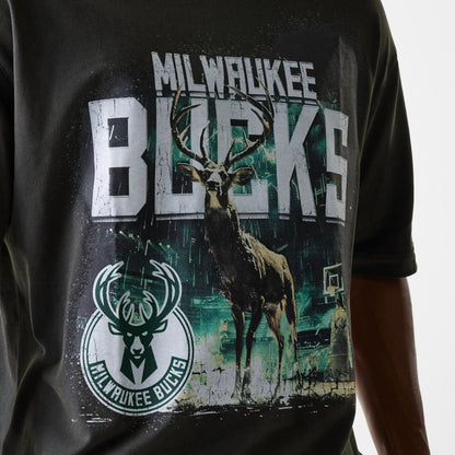 The Male model is wearing Milwaukee Bucks NBA Washed Graphic Grey T-Shirt 6