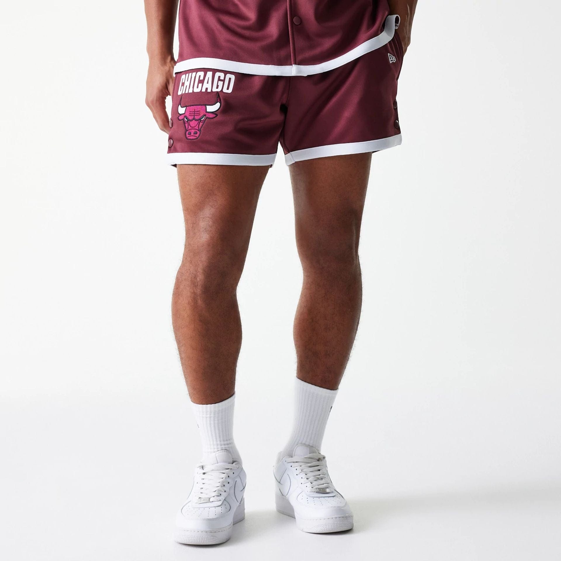 The Male model is wearing Chicago Bulls NBA Snap Button Dark Red Shorts 1