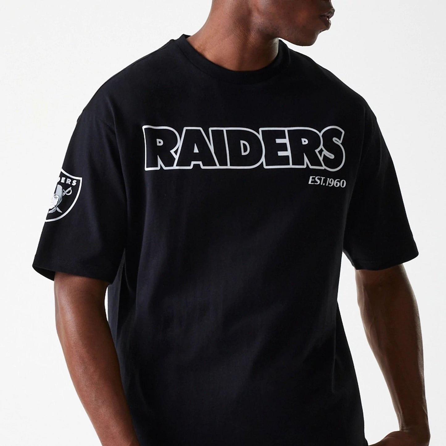 The Male model is wearing Las Vegas Raiders NFL Wordmark Black Oversized T-Shirt 6