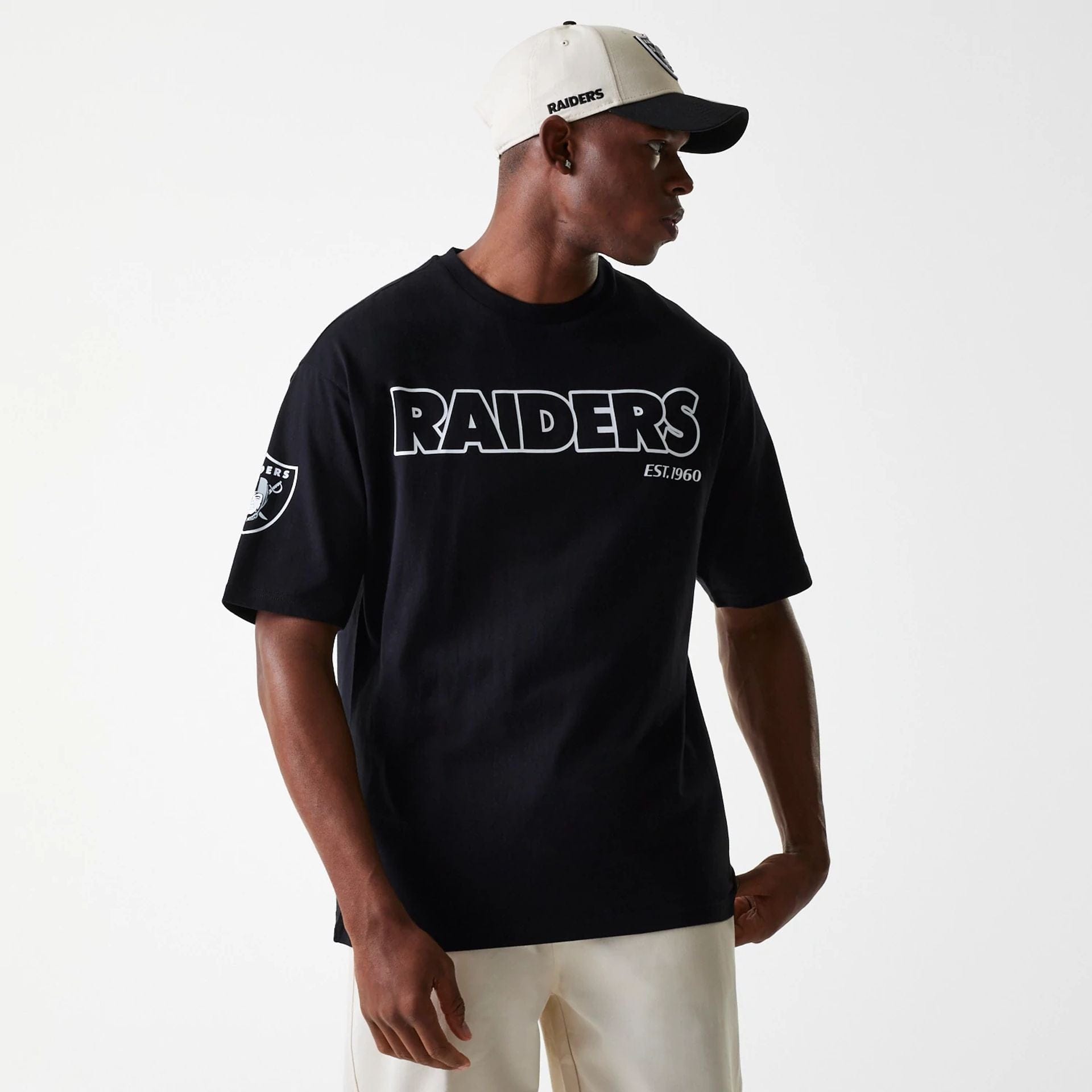 The Male model is wearing Las Vegas Raiders NFL Wordmark Black Oversized T-Shirt 1