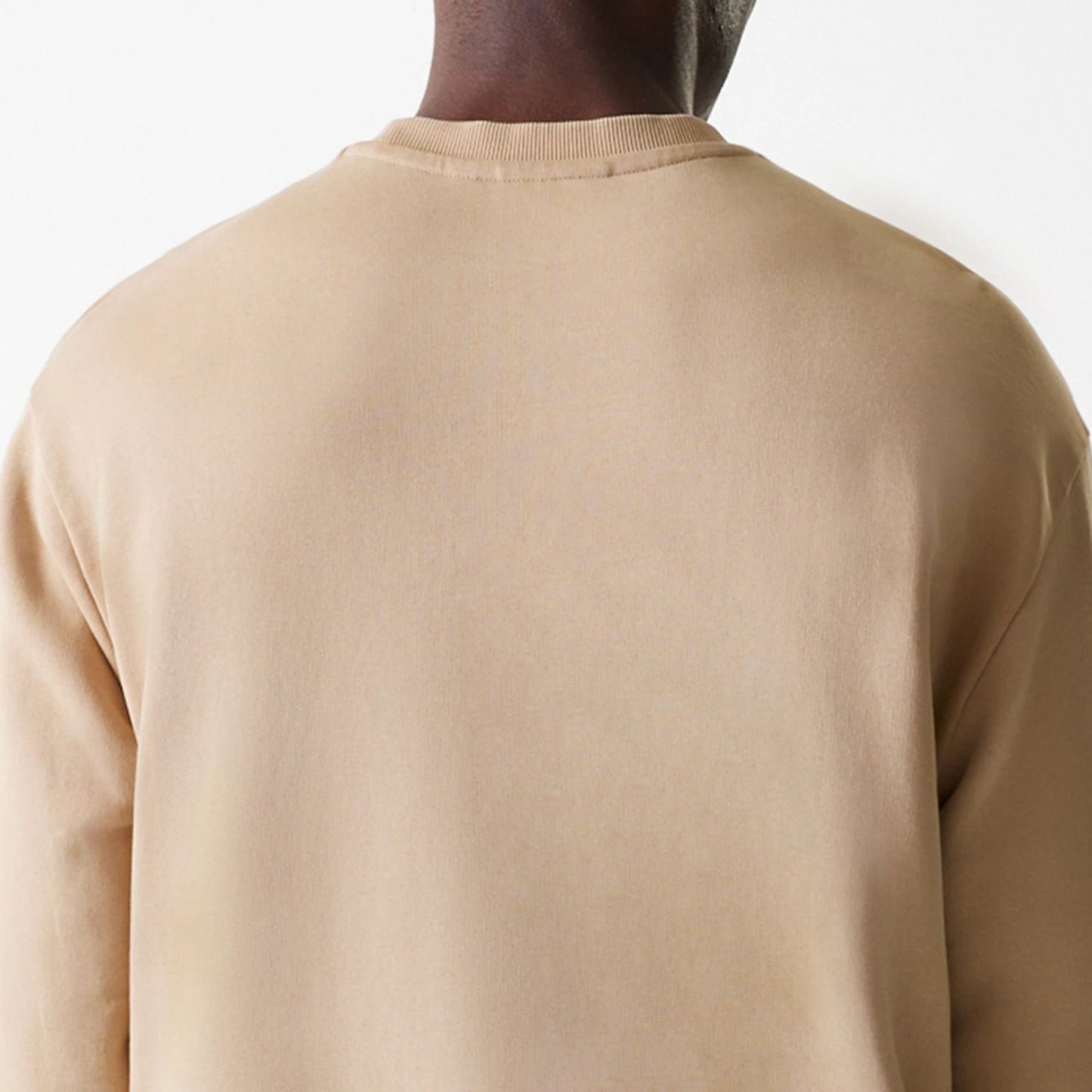 The Male model is wearing Kansas City Chiefs NFL Washed Super Bowl Beige Oversized Crew Neck Sweater 7