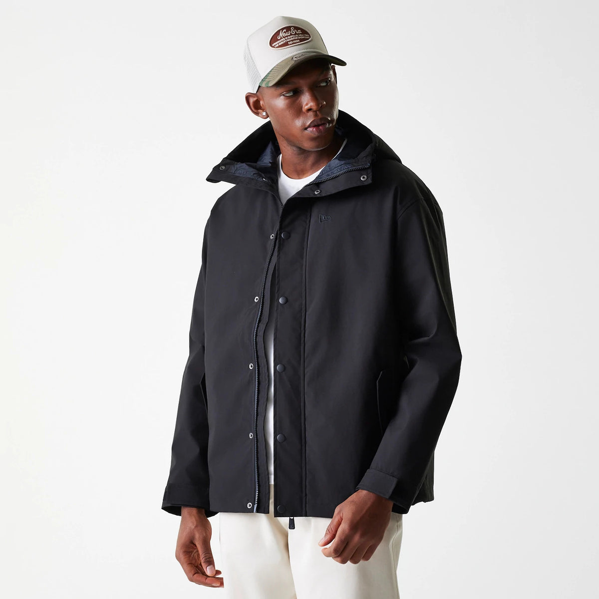 The Male model is wearing New Era Black Coach Jacket 5