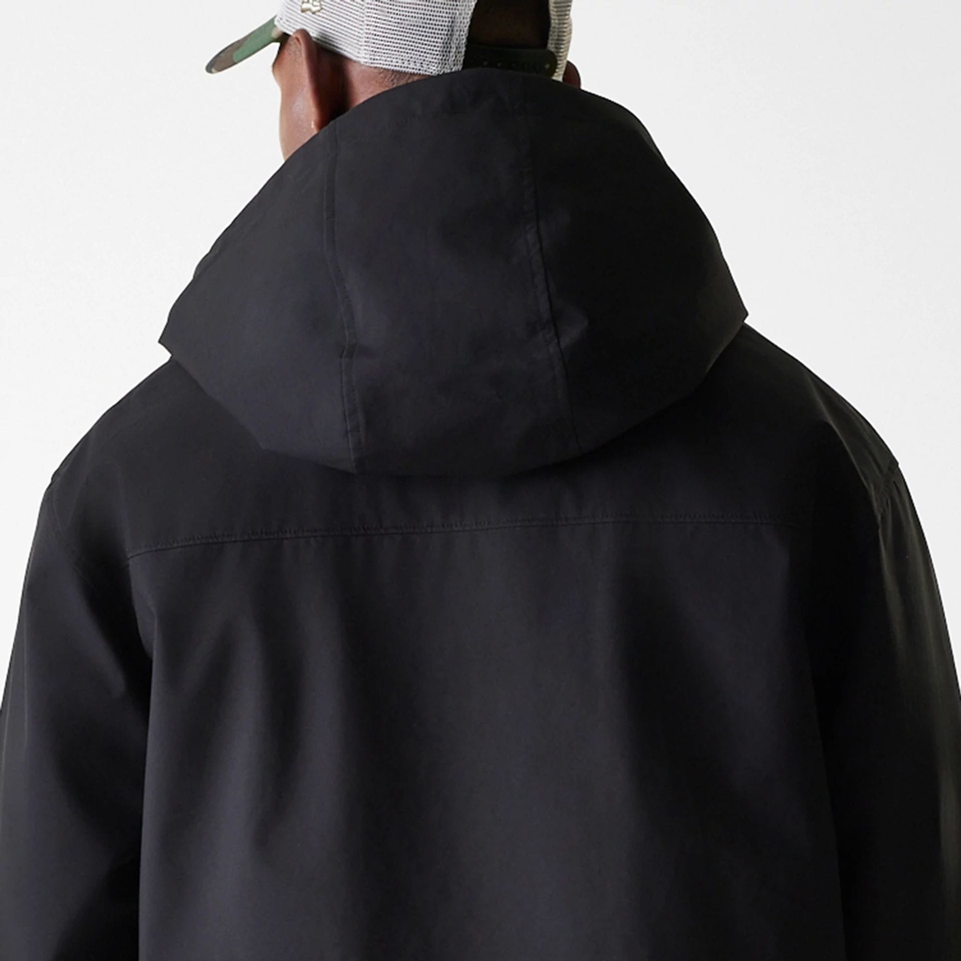 The Male model is wearing New Era Black Coach Jacket 7