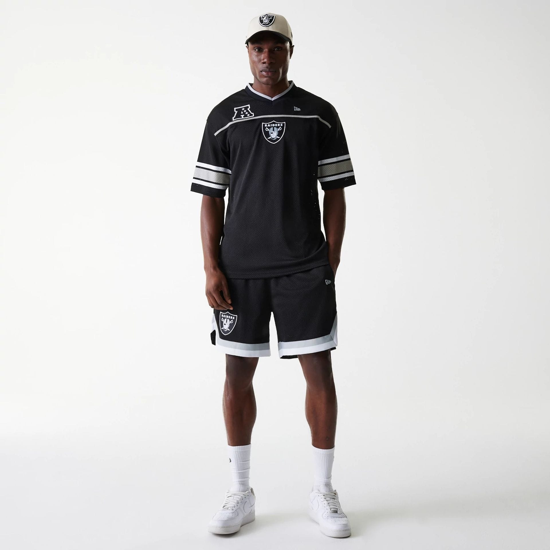 The Male model is wearing Las Vegas Raiders NFL Mesh Black Jersey 8
