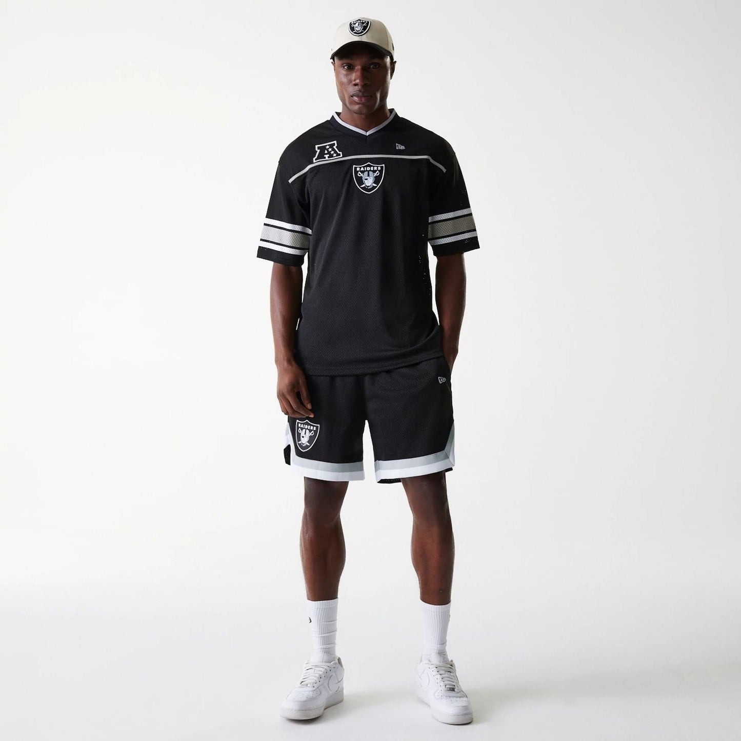The Male model is wearing Las Vegas Raiders NFL Mesh Black Jersey 8