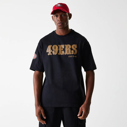 The Male model is wearing San Francisco 49ers NFL Wordmark Black Oversized T-Shirt 1