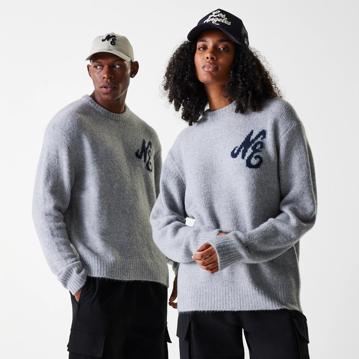 The Male model is wearing New Era Knit Grey Oversized Knit Sweater 1