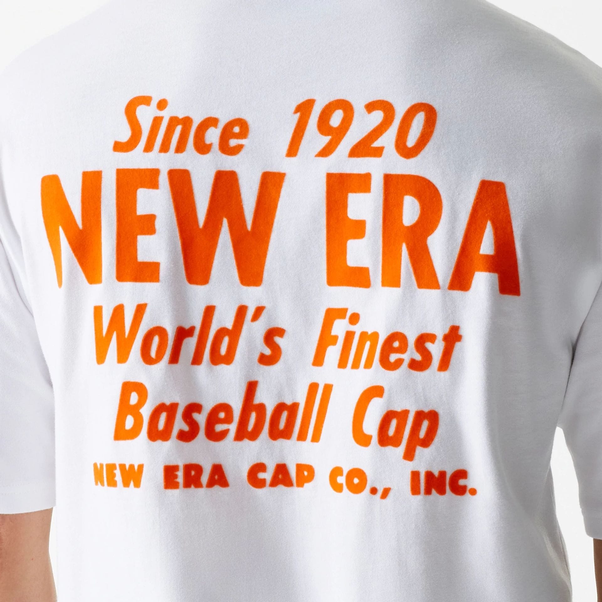 The Male model is wearing New Era Graphic White Oversized T-Shirt 4