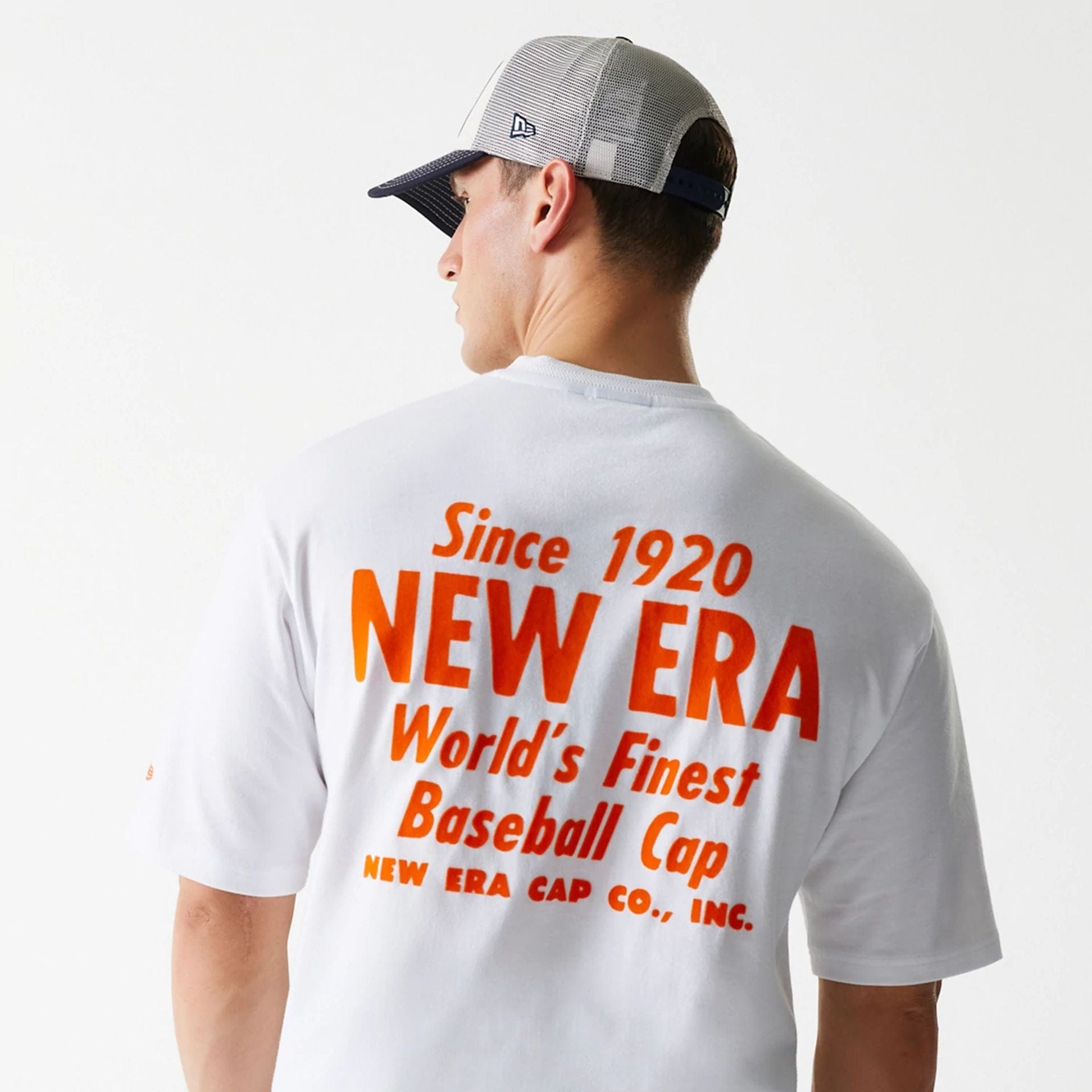 The Male model is wearing New Era Graphic White Oversized T-Shirt 6