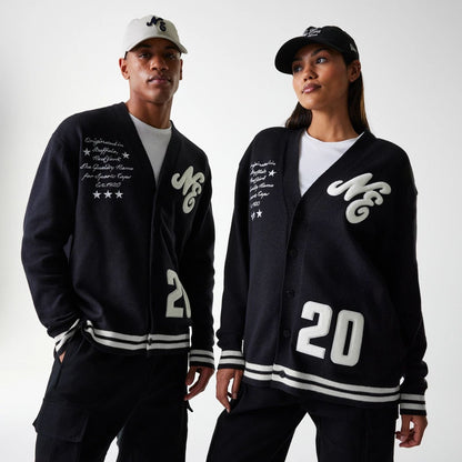 The Male model is wearing New Era Knit Black Cardigan 1