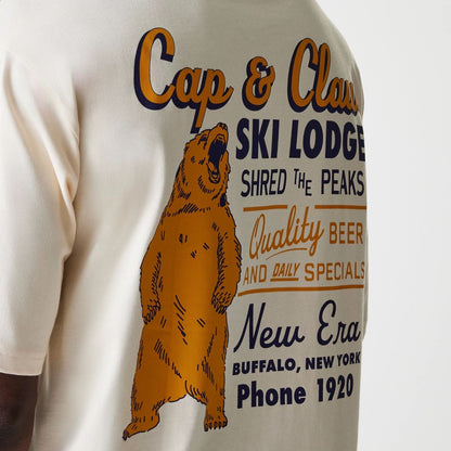 The Male model is wearing New Era Animal Graphic Light Beige Oversized T-Shirt 6