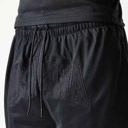 The Male model is wearing New Era Mesh Black Shorts 4