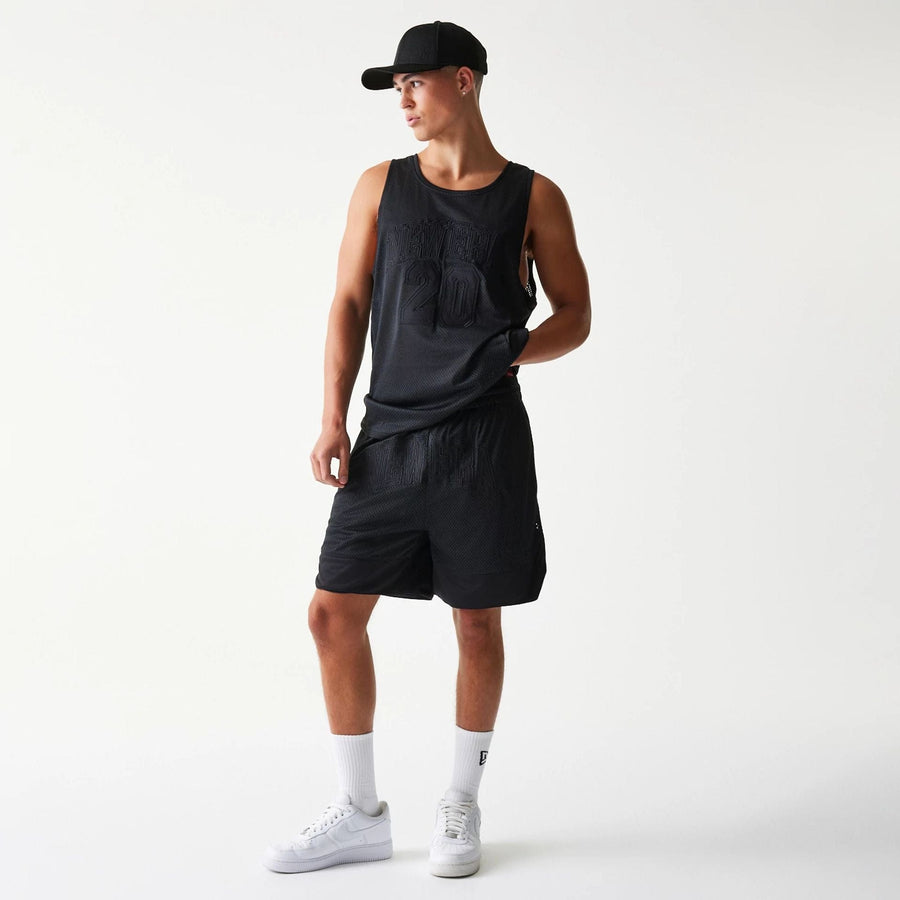 The Male model is wearing New Era Mesh Black Shorts 6