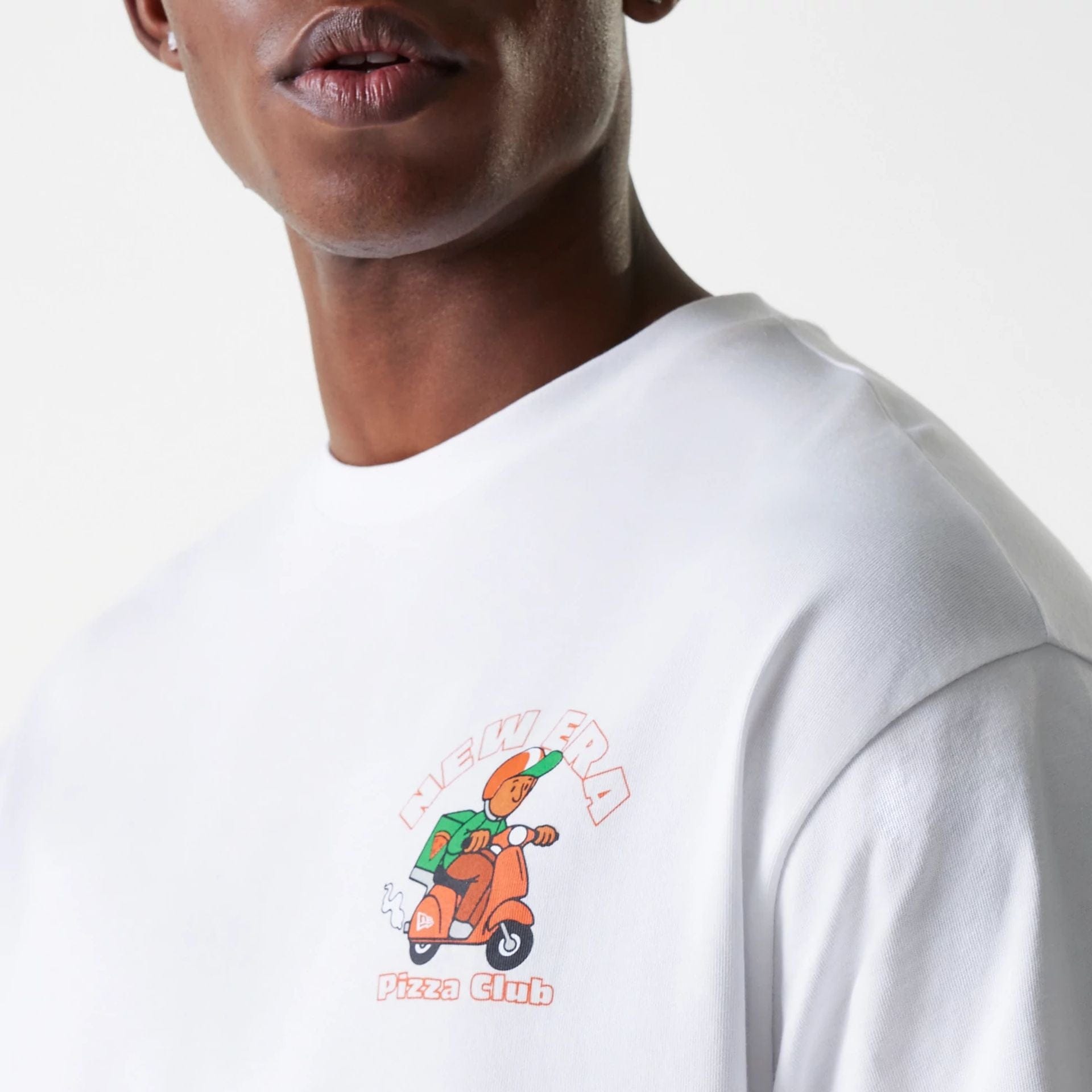 The Male model is wearing New Era Pizza Club Graphic White Oversized T-Shirt 7