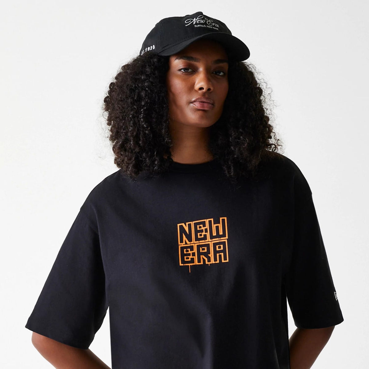The Male model is wearing New Era Graffiti Graphic Black Oversized T-Shirt 6