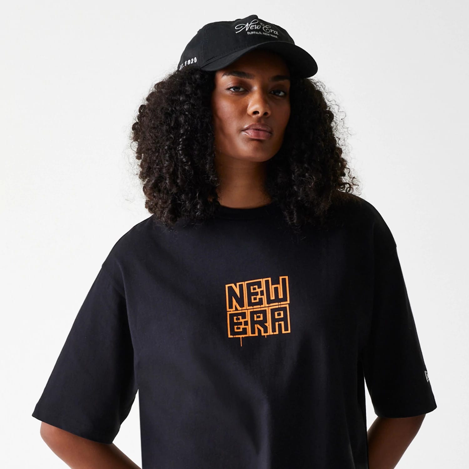The Male model is wearing New Era Graffiti Graphic Black Oversized T-Shirt 6