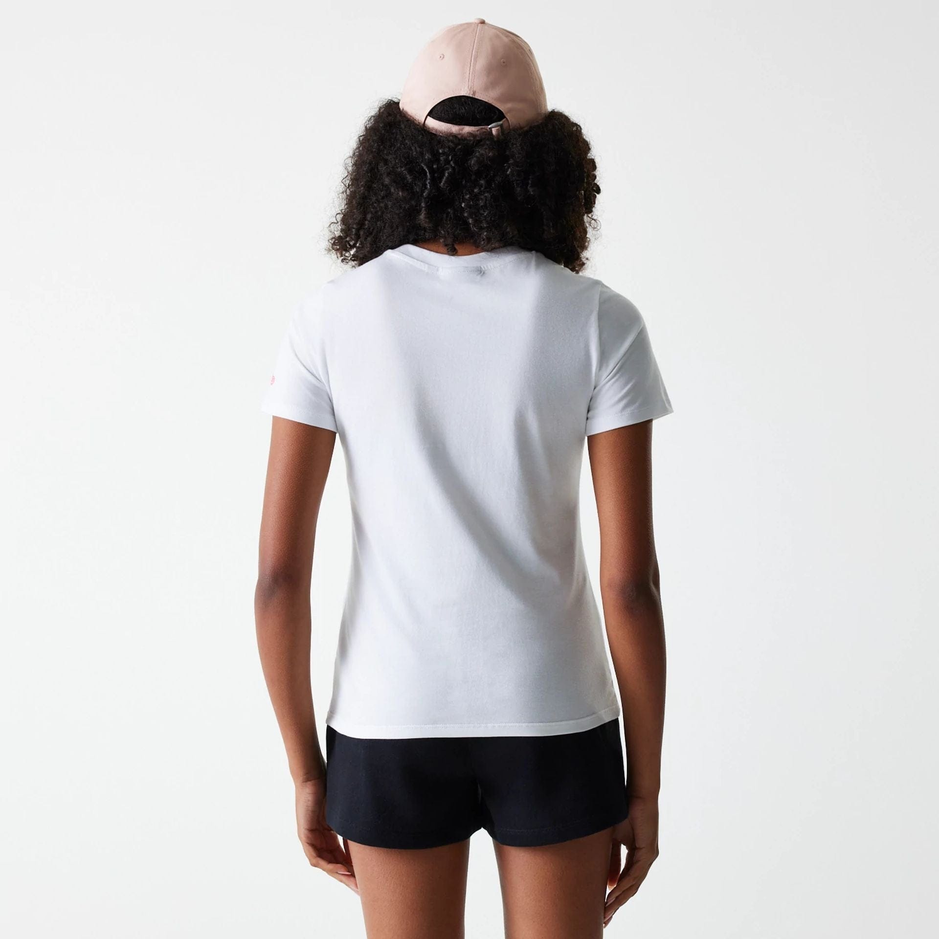 The Female model is wearing New York Yankees Womens MLB Midi League Essential White T-Shirt 2