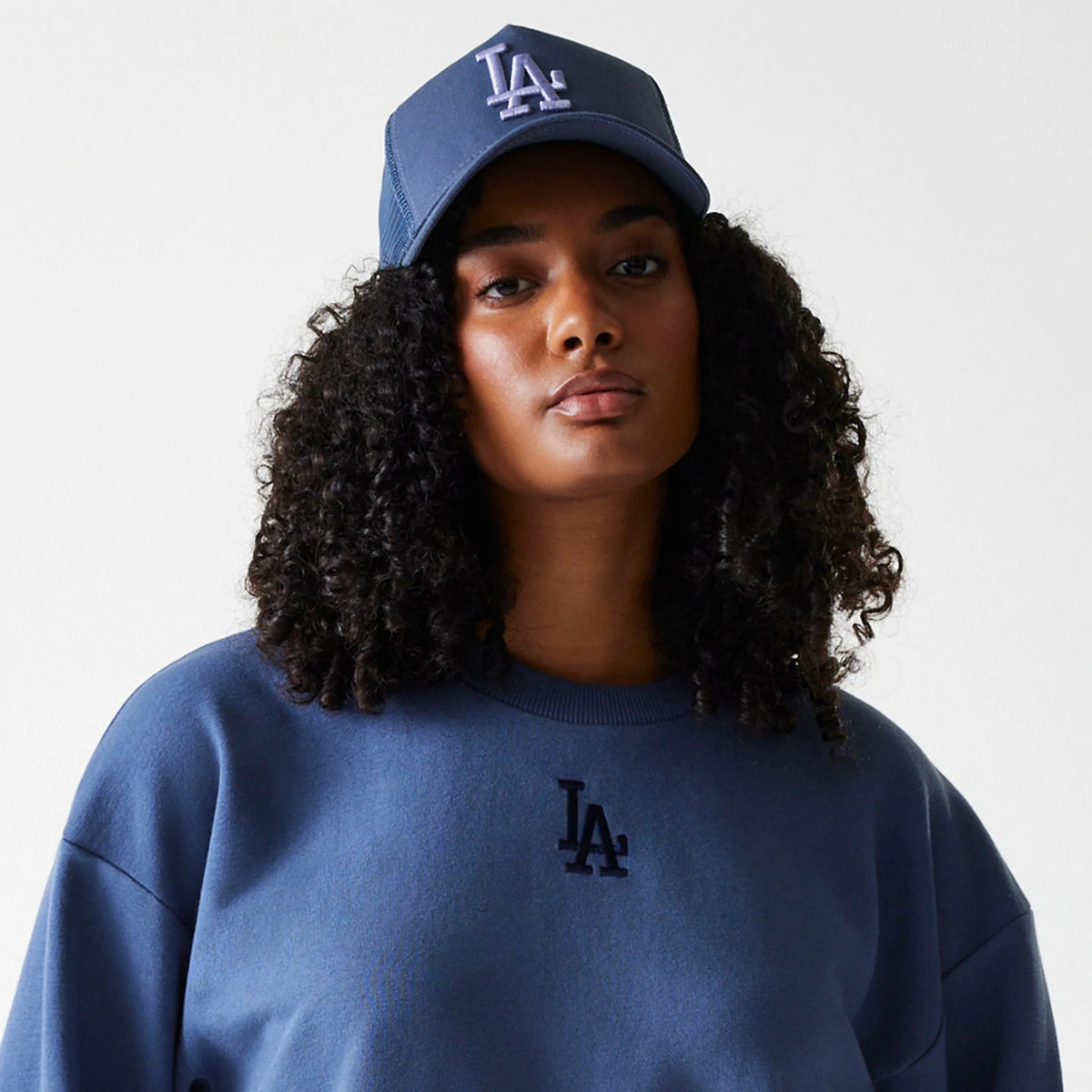 The Female model is wearing LA Dodgers Womens MLB Midi League Essential Dark Blue Cropped Crew Neck Sweater 6