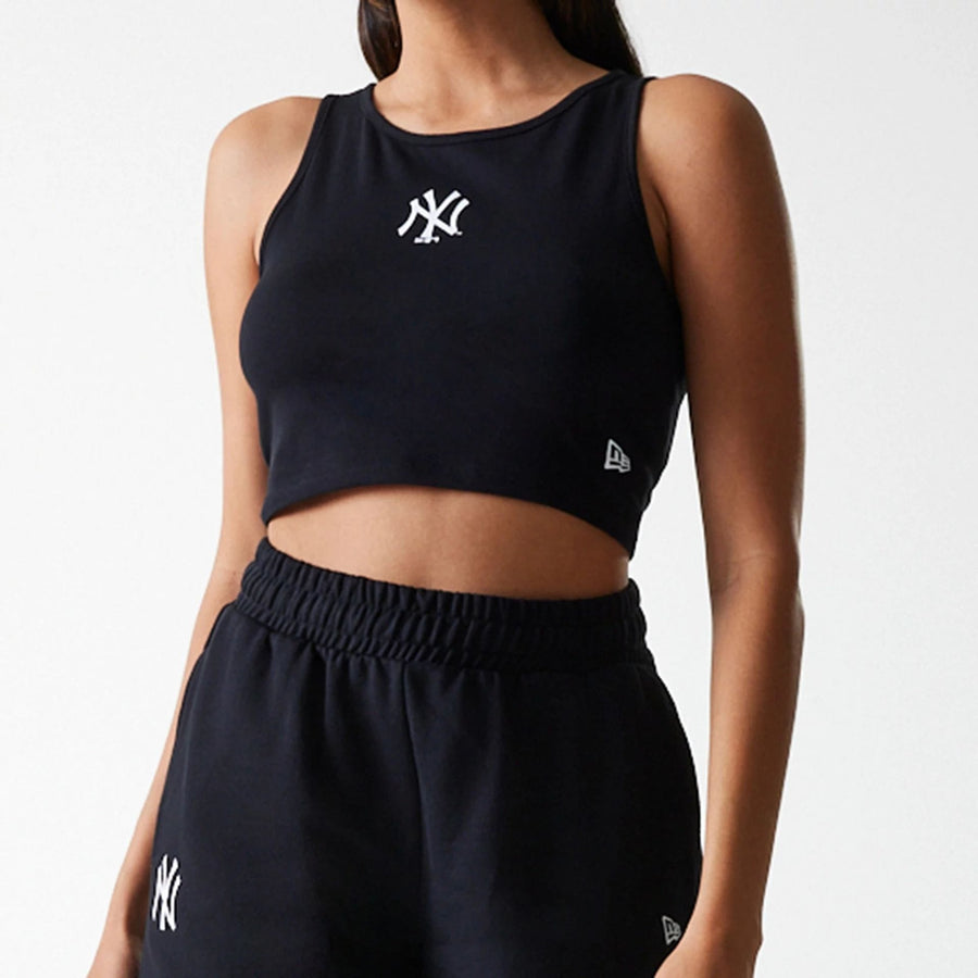 The Female model is wearing New York Yankees Womens MLB Midi League Essential Black Crop Tank Top 3