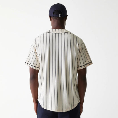 The Male model is wearing New Era Pinstripe Light Beige Jersey 2