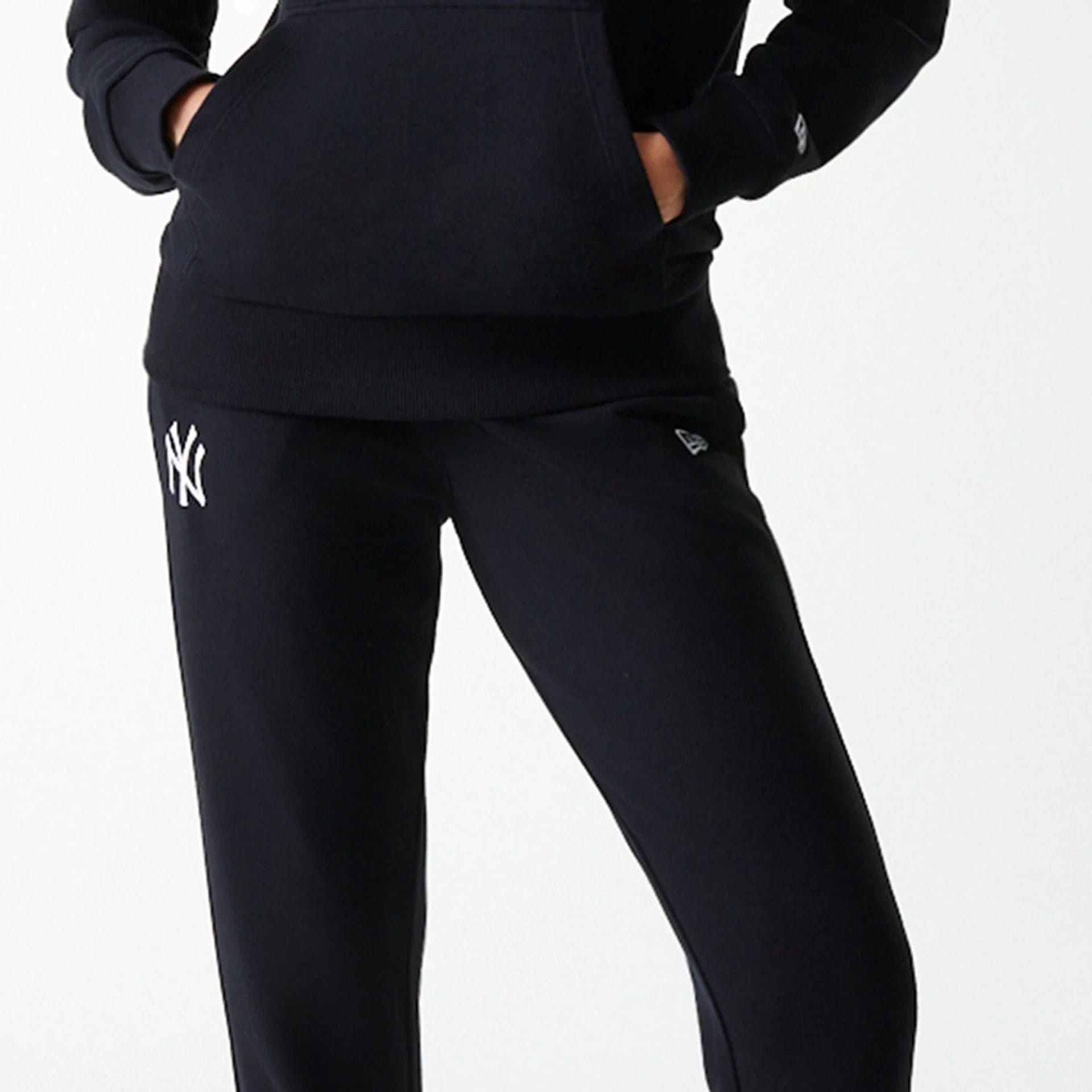 The Female model is wearing New York Yankees Womens MLB Midi League Essential Black Joggers 2