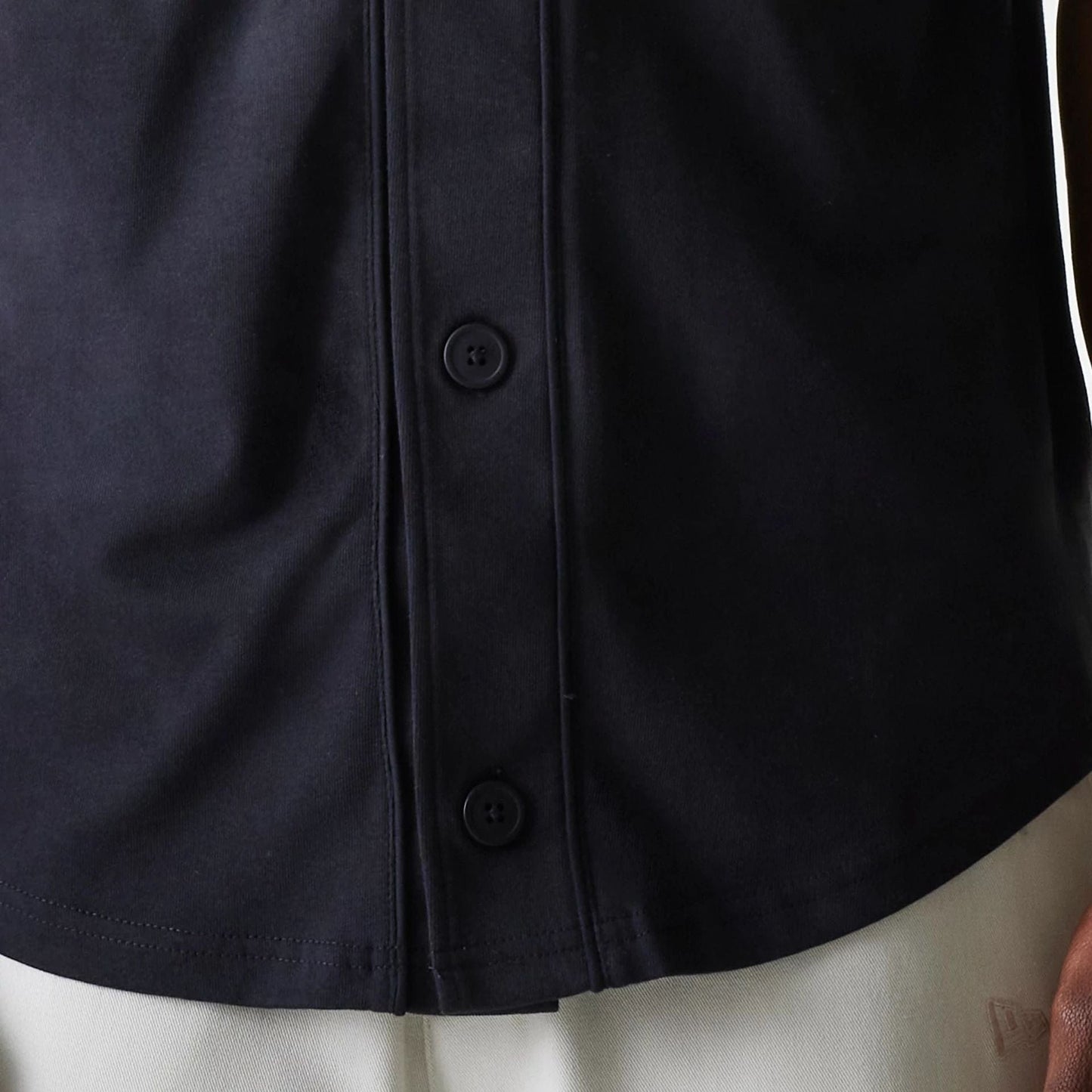 The Male model is wearing New Era Pinstripe Black Jersey 6