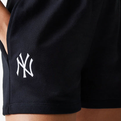 The Female model is wearing New York Yankees Womens MLB Midi League Essential Black Shorts 3