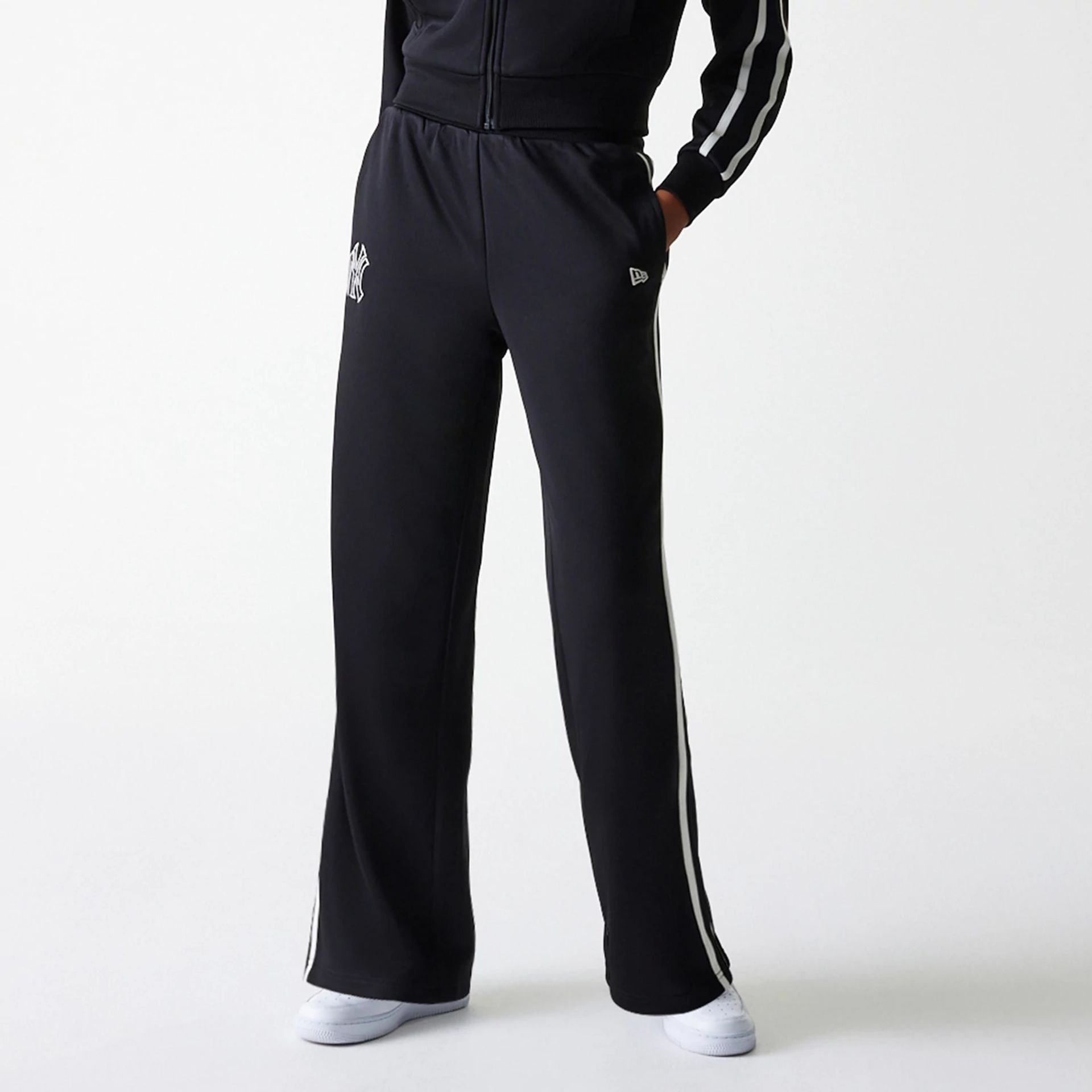 The Female model is wearing New York Yankees Womens MLB Midi Logo Black Track Pants 6