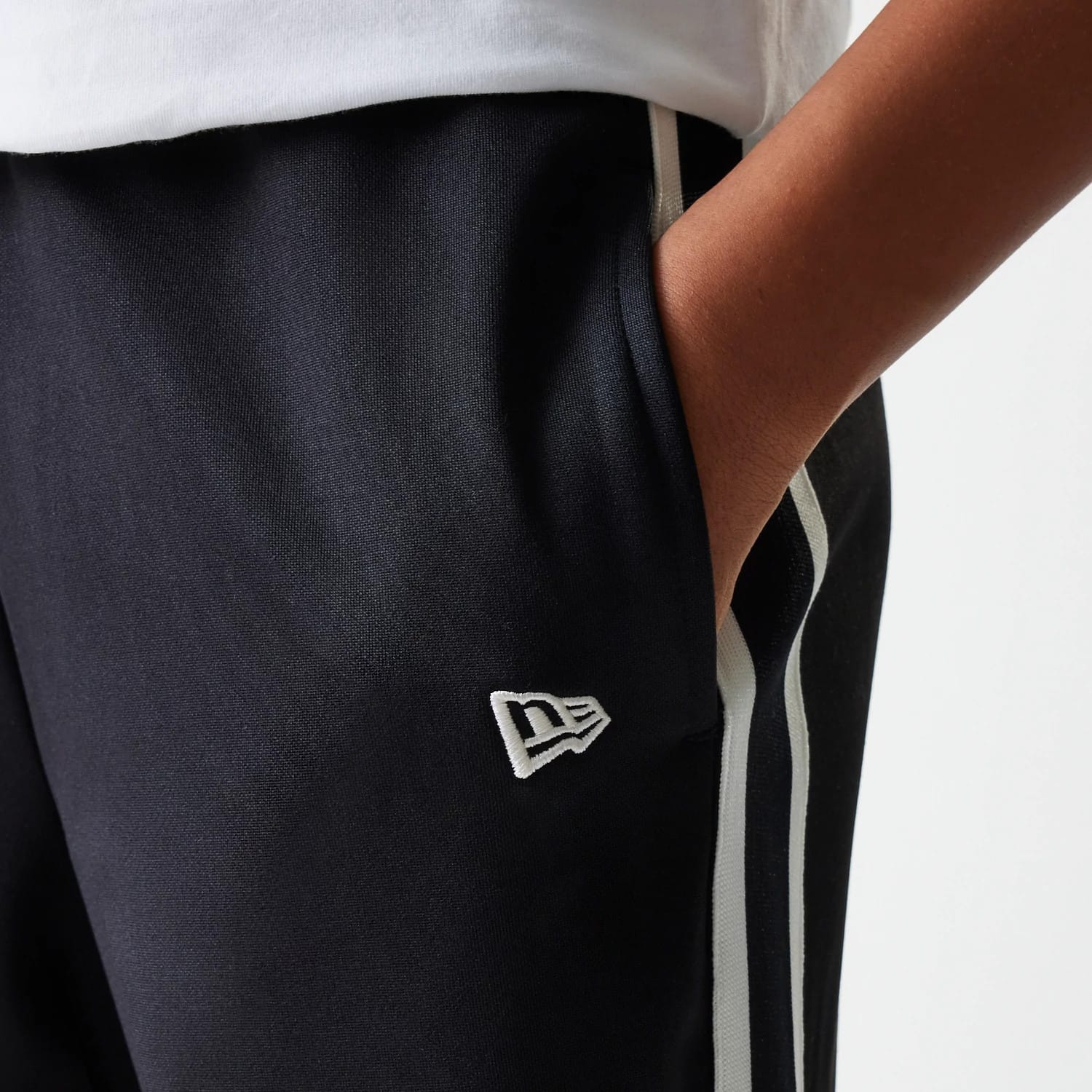 The Female model is wearing New York Yankees Womens MLB Midi Logo Black Track Pants 4