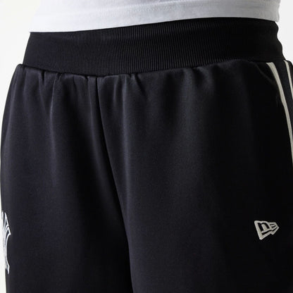 The Female model is wearing New York Yankees Womens MLB Midi Logo Black Track Pants 5