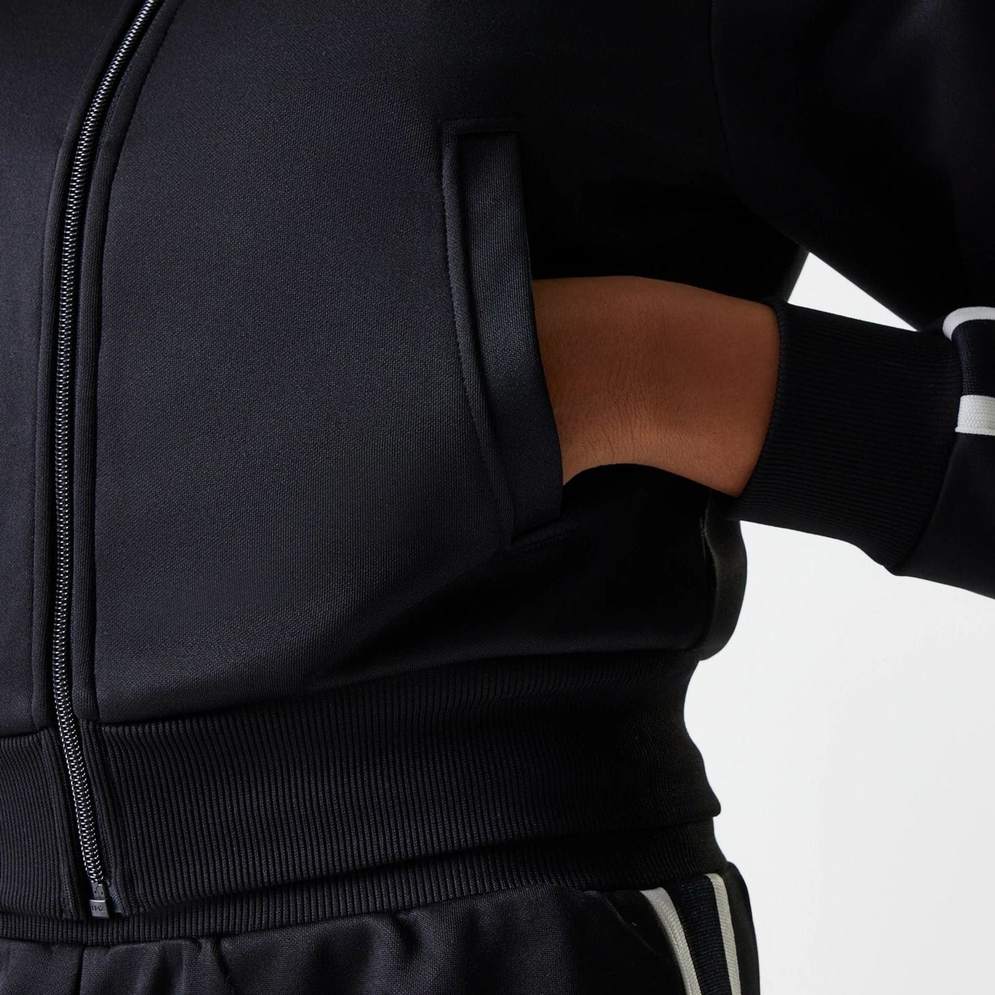 The Female model is wearing New York Yankees Womens MLB Midi Logo Black Track Jacket 4