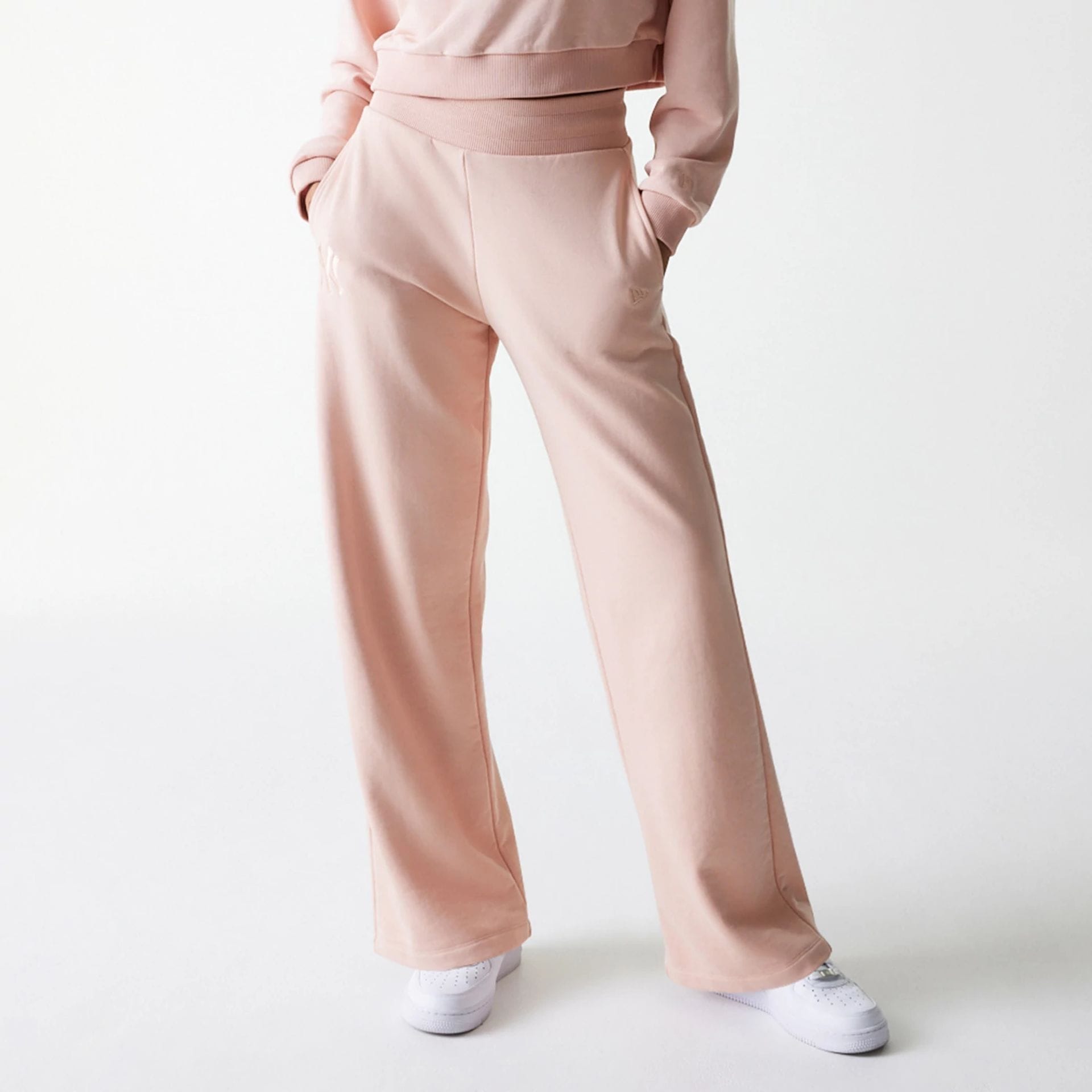 The Female model is wearing New York Yankees Womens MLB Tonal Pastel Pink Straight Leg Joggers 7